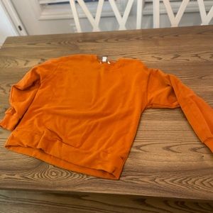 Athleta orange pullover medium